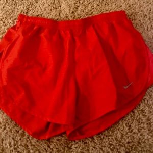 Red nike shorts